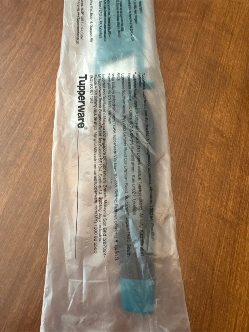 Tupperware Kitchen Bread Knife with Teal Handle and Silver Blade